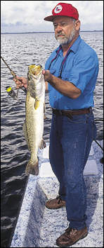 Author is shown here with a 25-1/2-inch trout.
