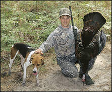 Texas Parks & Wildlife Department's eastern wild turkey program leader John Burk and 'Turkey'.